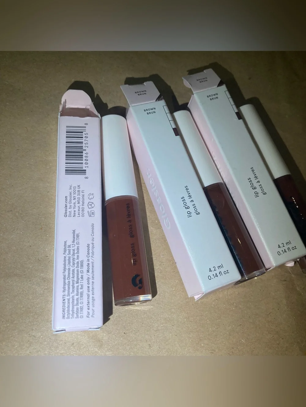 3 x Glossier lip gloss